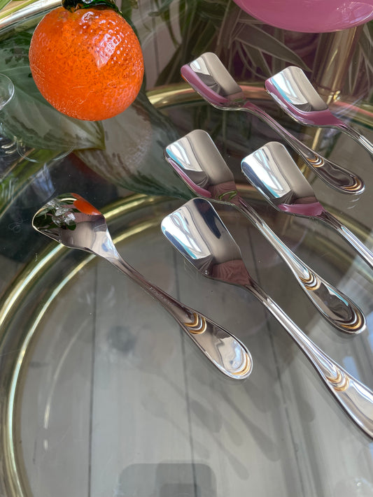 Teaskeer in gold and silver