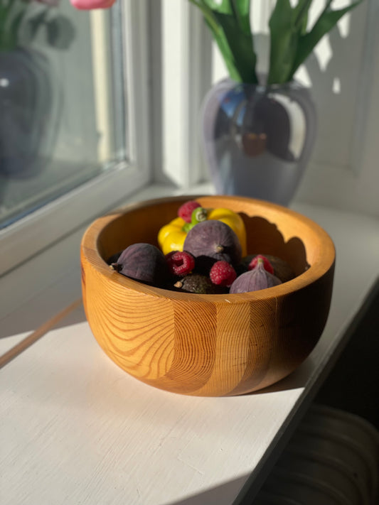Wooden bowl in pine wood
