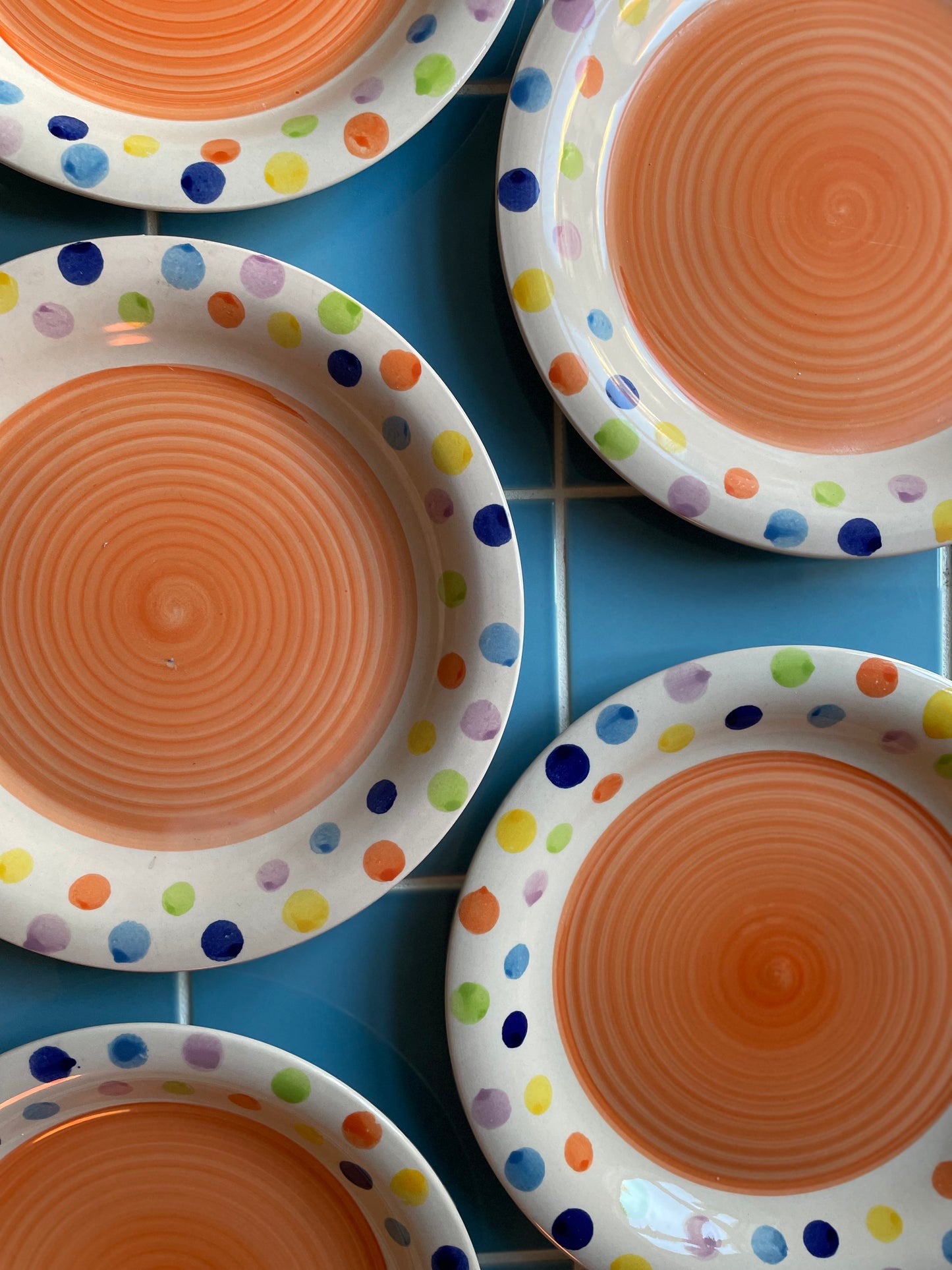 Tivoli-style dinner plates with an orange center