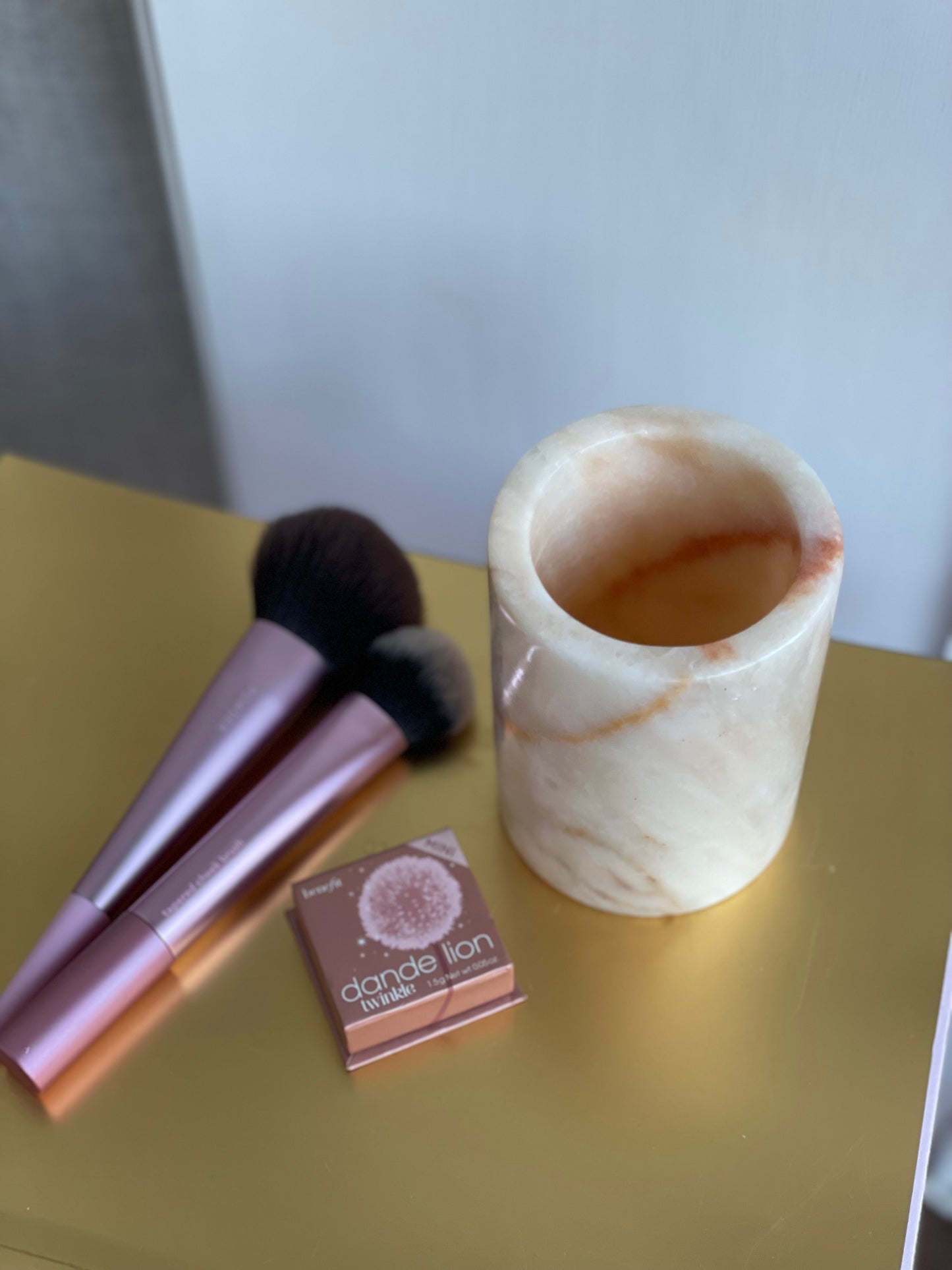 Vase and marble rose
