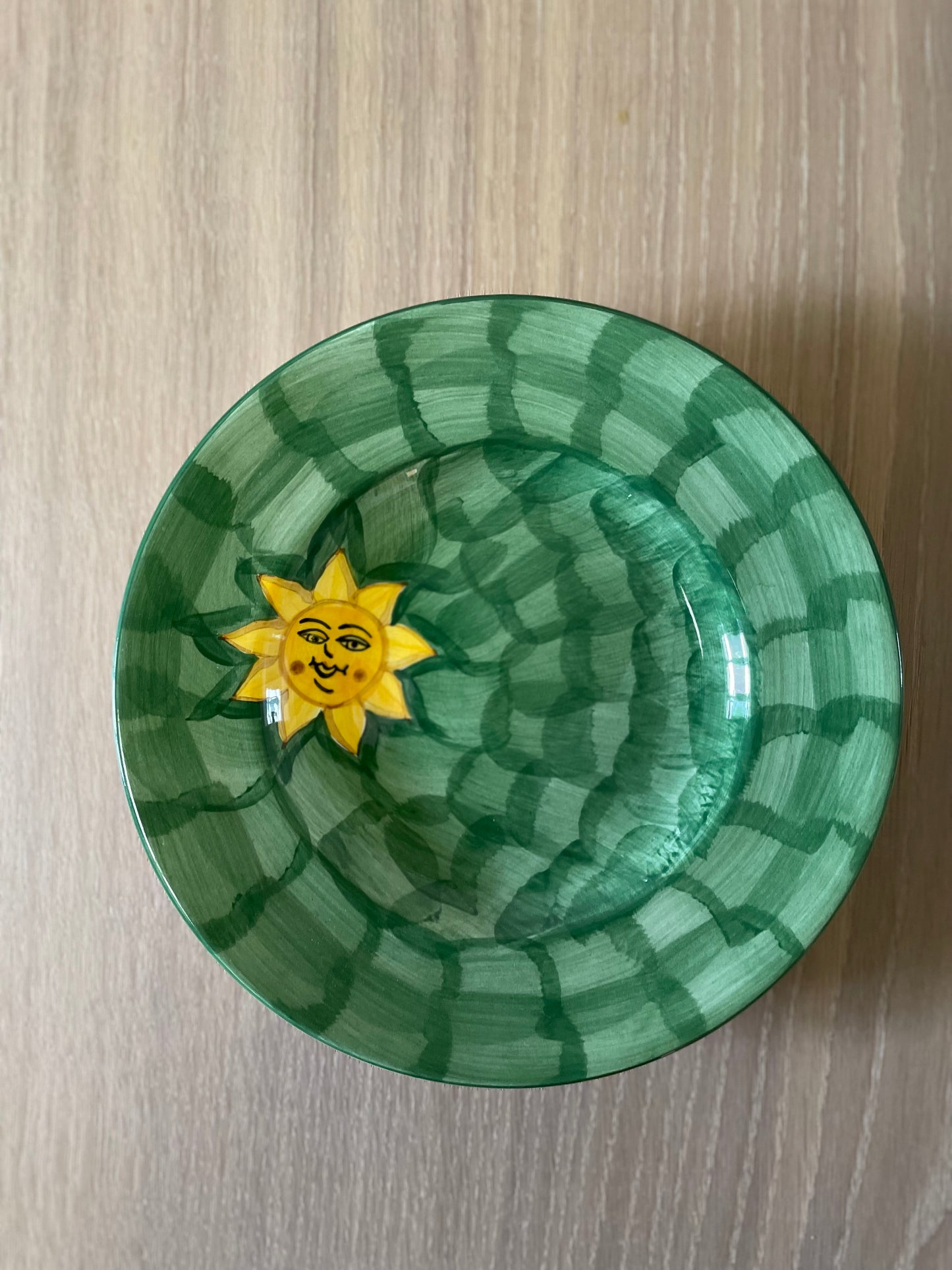 Green large breakfast plates with happy sun