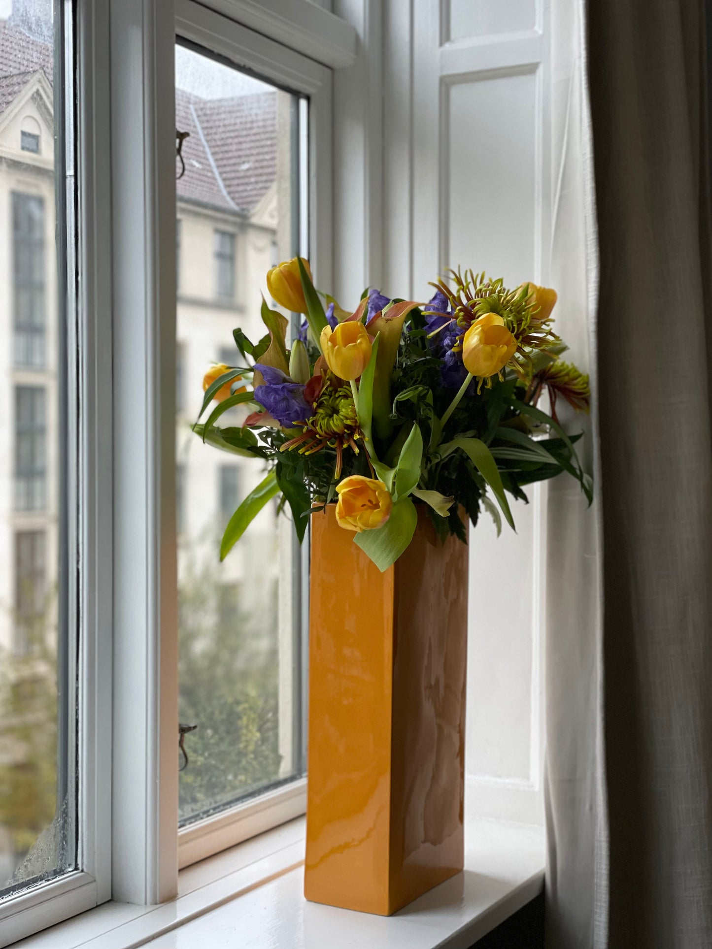 Tall orange rectangular ceramic vase