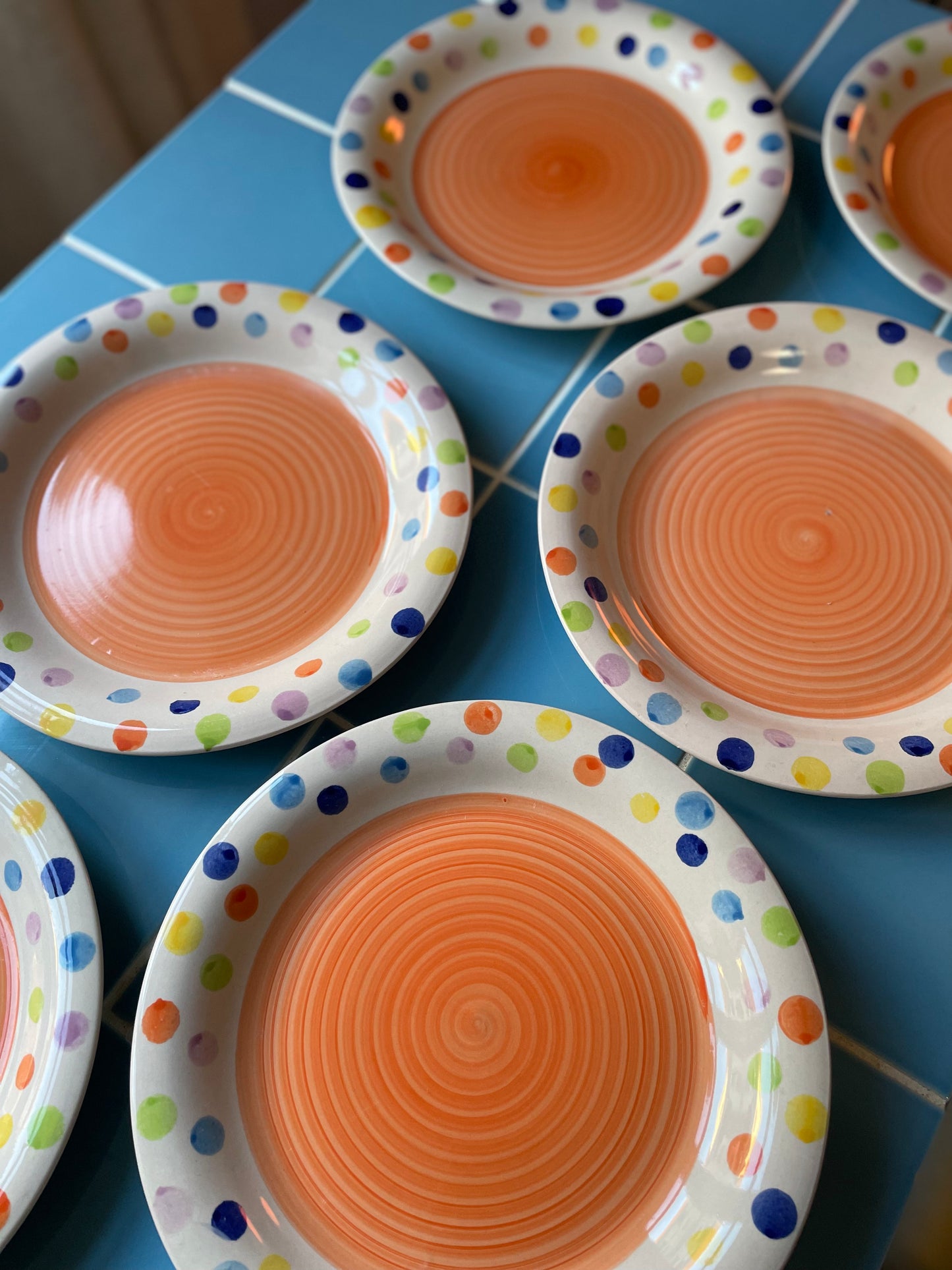 Tivoli-style dinner plates with an orange center