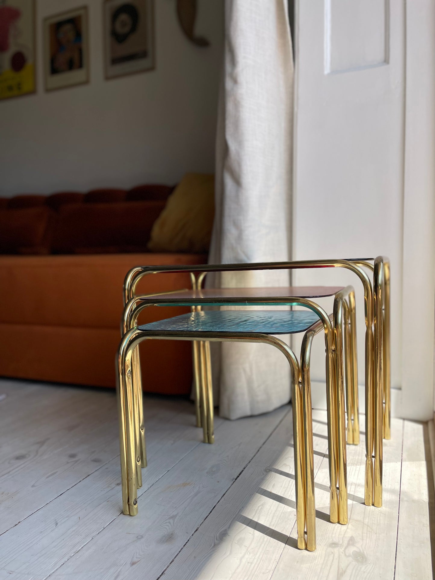 Brass insert tables with colored glass tops