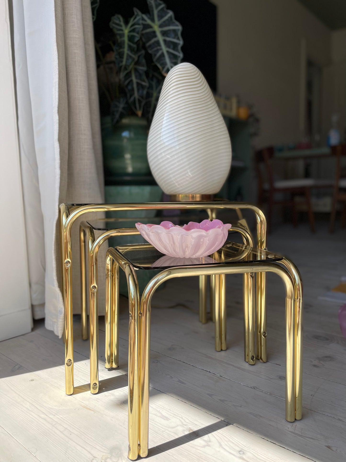 Brass insert tables with smoked glass