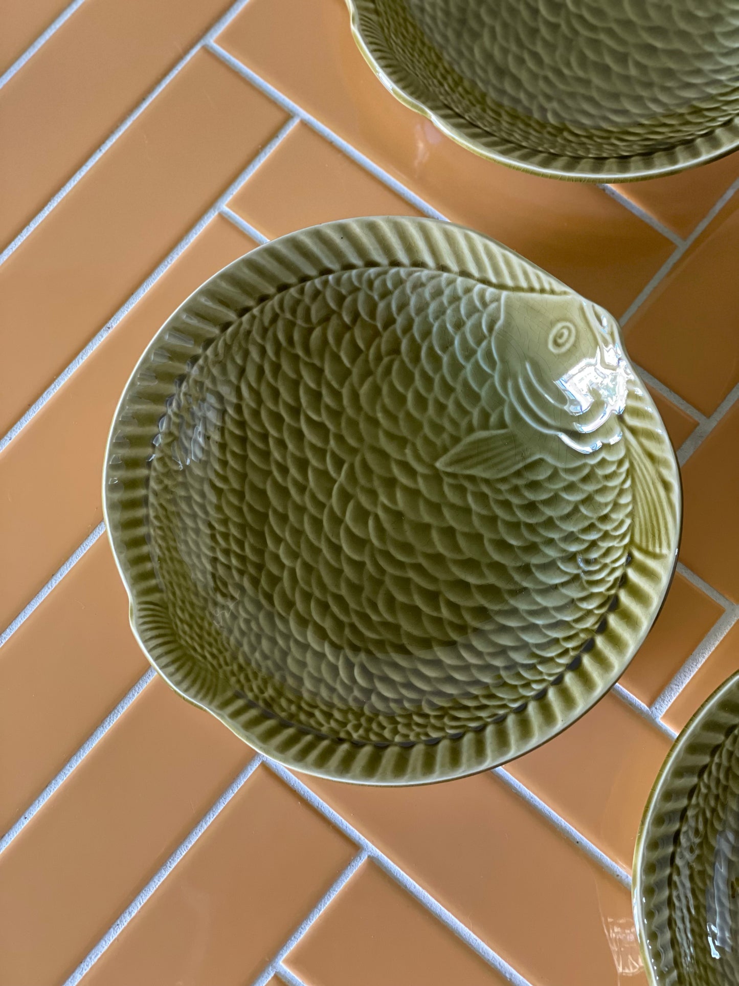 Deep brown Sarreguemines fish plates