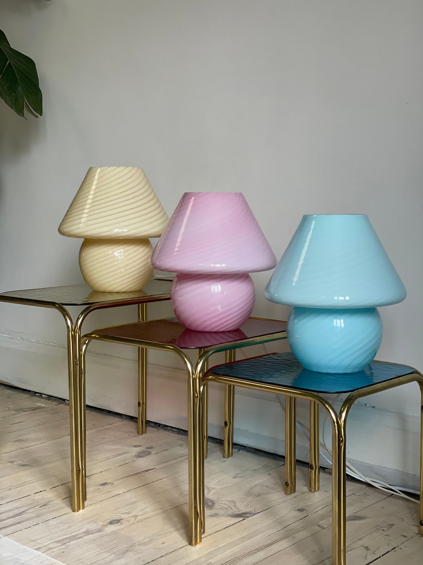 Brass insert tables with colored glass tops