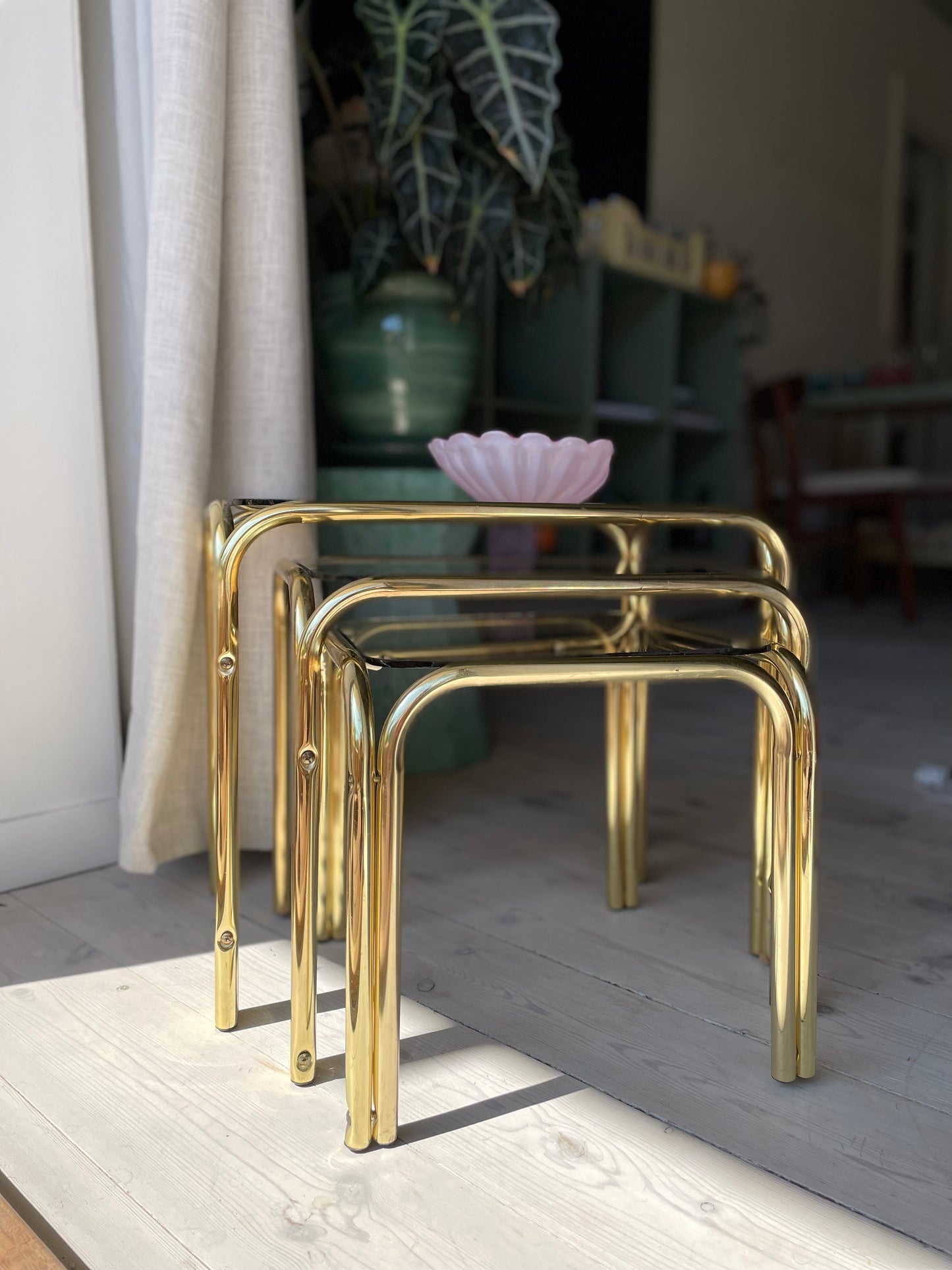 Brass insert tables with smoked glass
