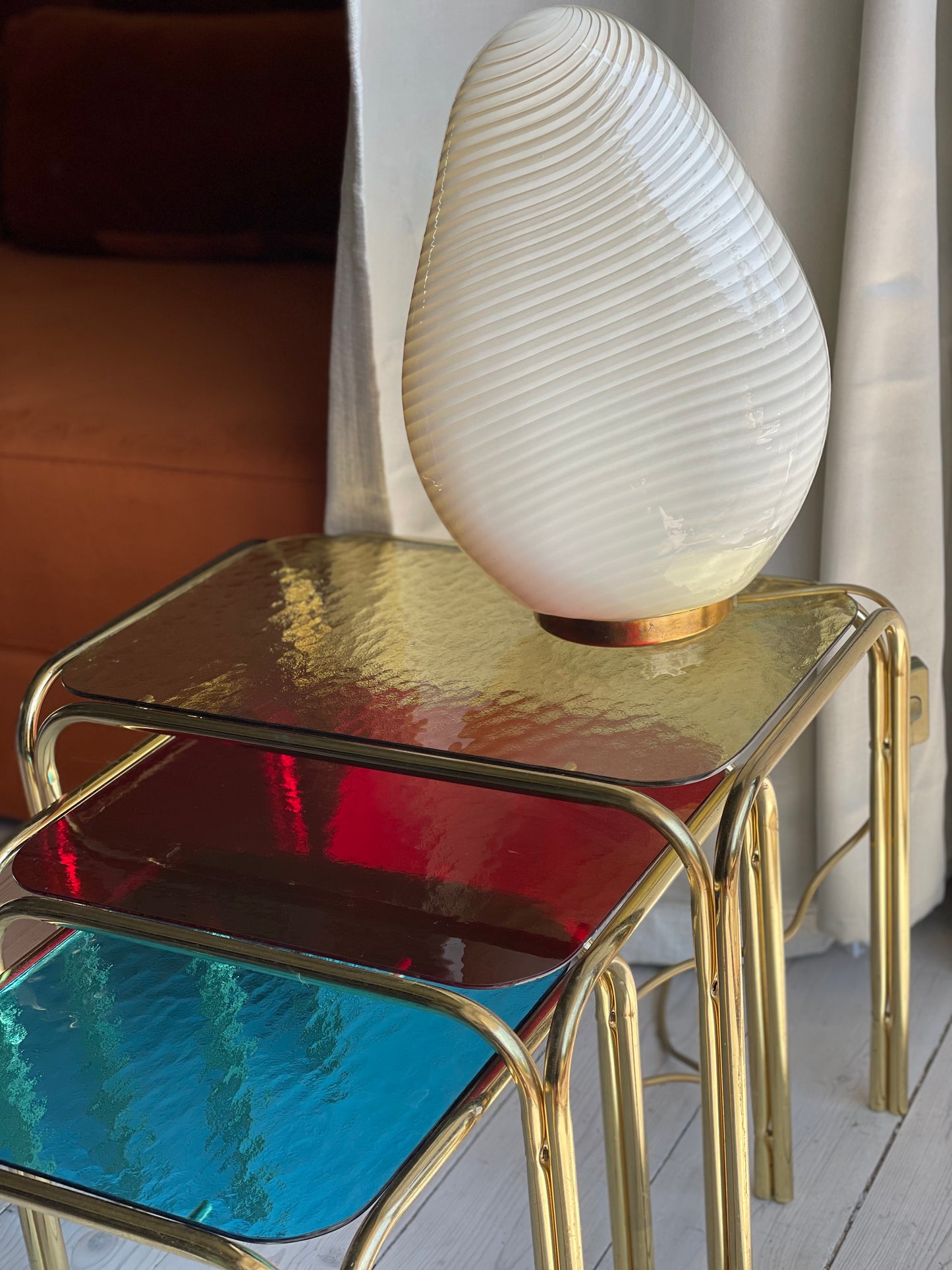 Brass insert tables with colored glass tops