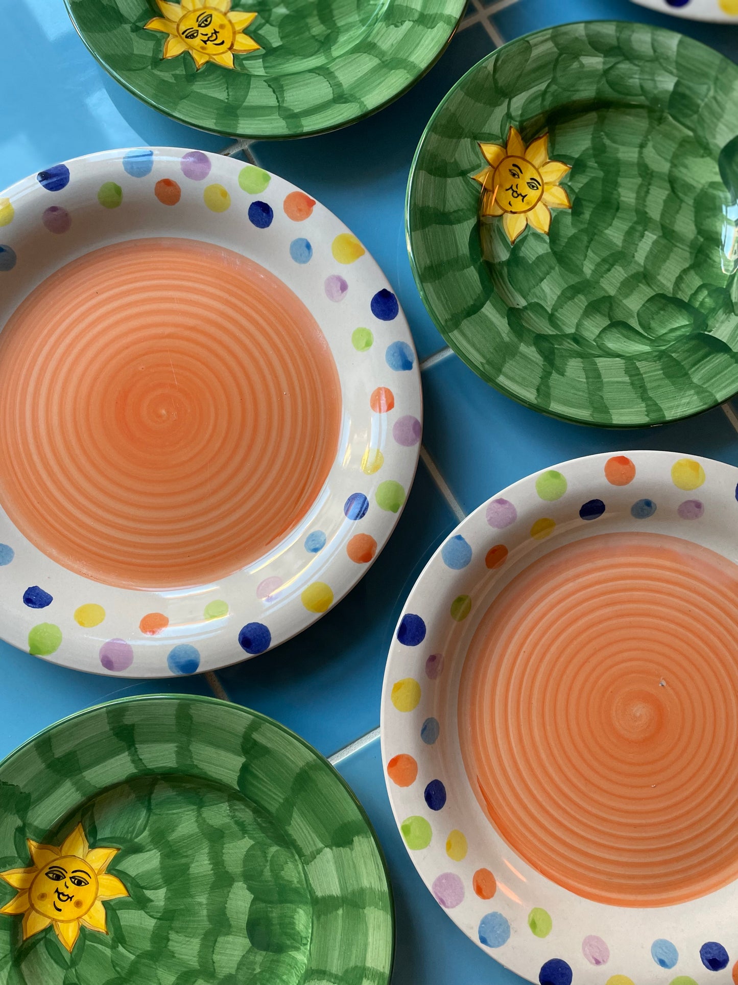 Green large breakfast plates with happy sun