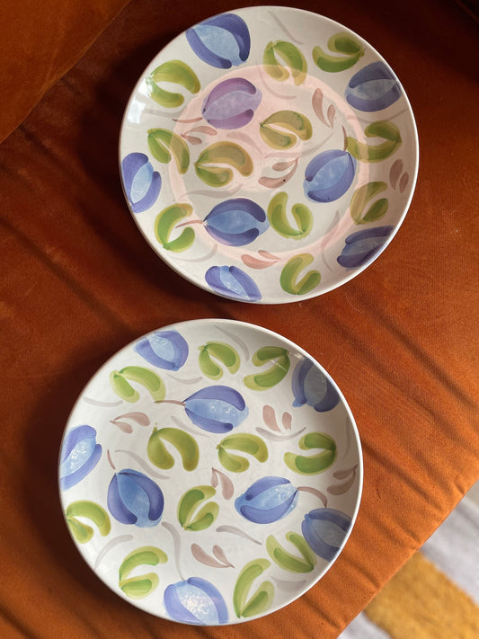 Large plates or dishes with plums