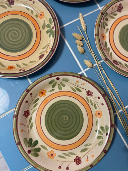 Flowered dinner plates in orange and green