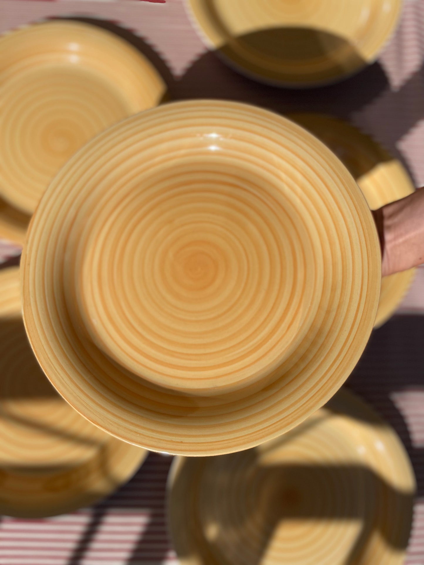 Yellow dinner plate with swirl