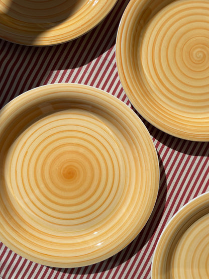 Yellow dinner plate with swirl