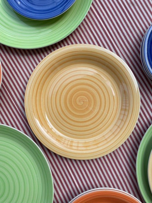 Yellow dinner plate with swirl