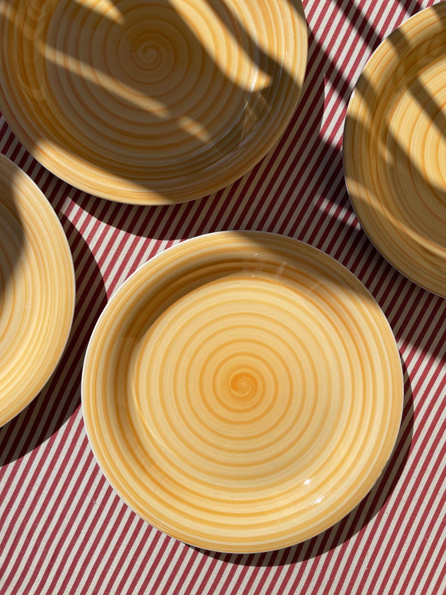 Yellow dinner plate with swirl