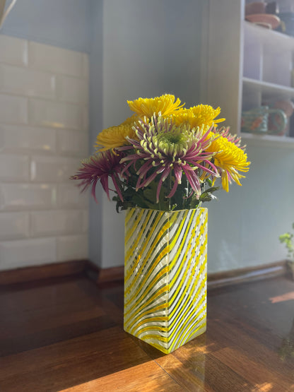 Wavy yellow glass vase