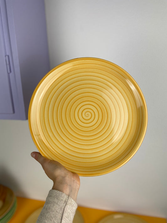 Large yellow Italian dinner plates with swirl