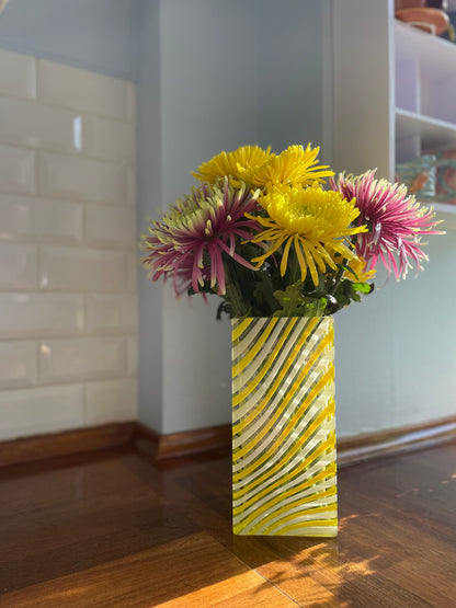Wavy yellow glass vase