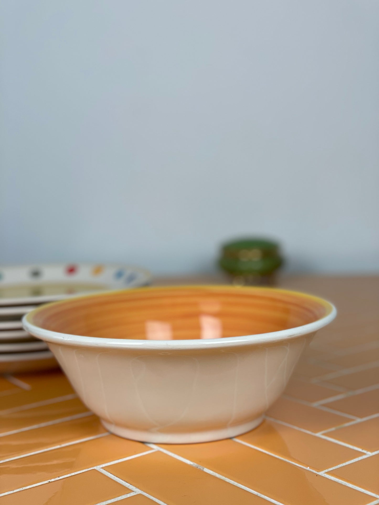 Large bowl with warm orange swirl