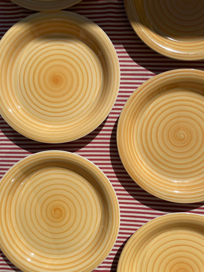 Yellow dinner plate with swirl