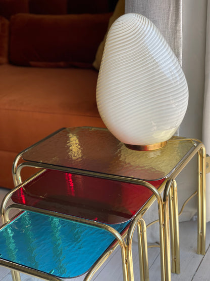 Brass insert tables with colored glass tops