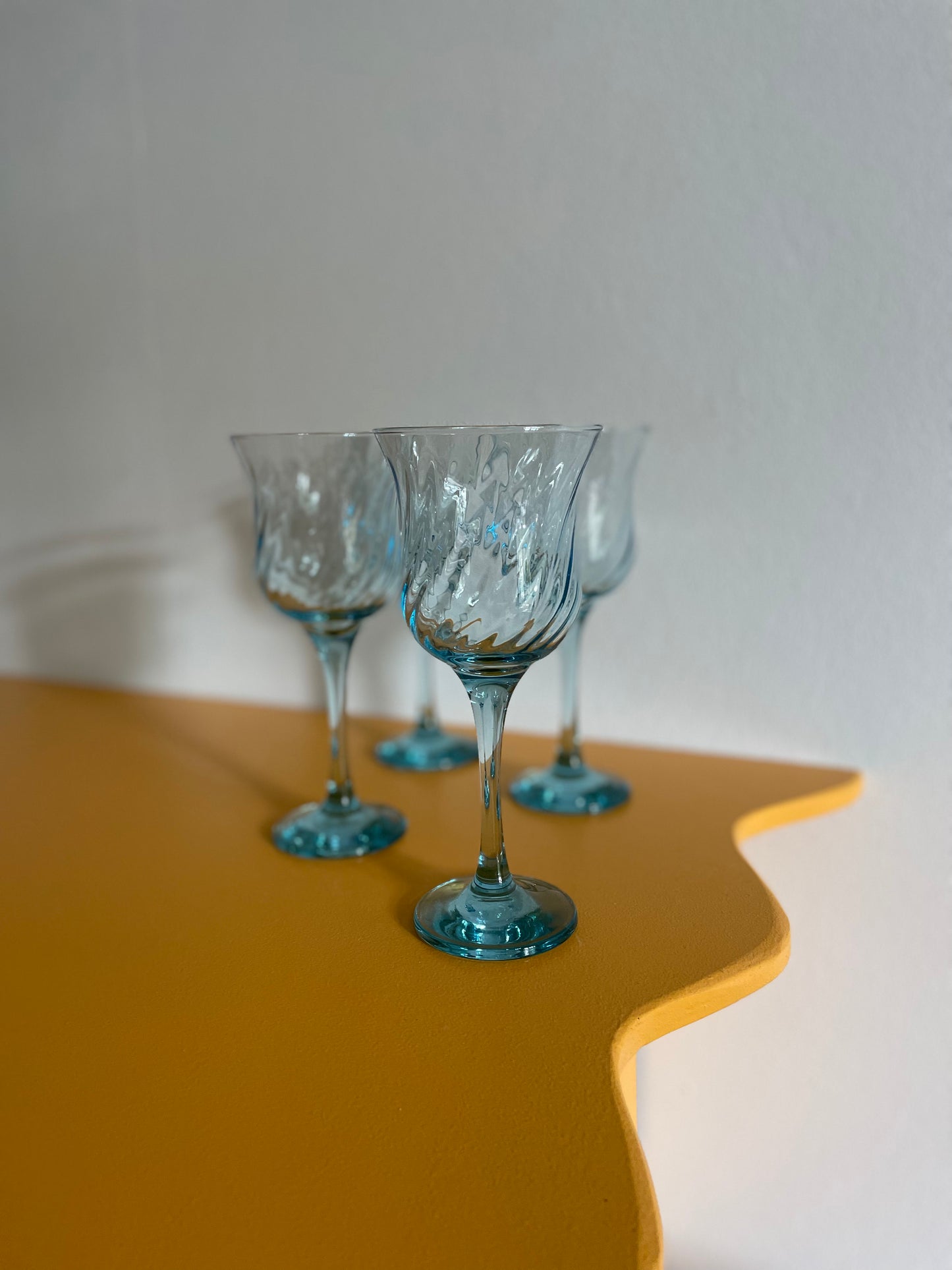 Beautiful blue wine glasses with swirl