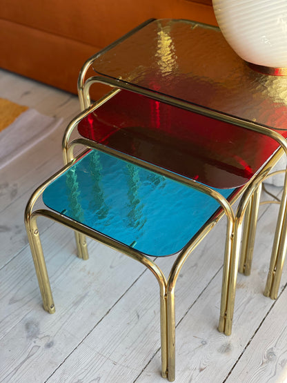 Brass insert tables with colored glass tops