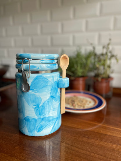 Blue lidded jar with spoon
