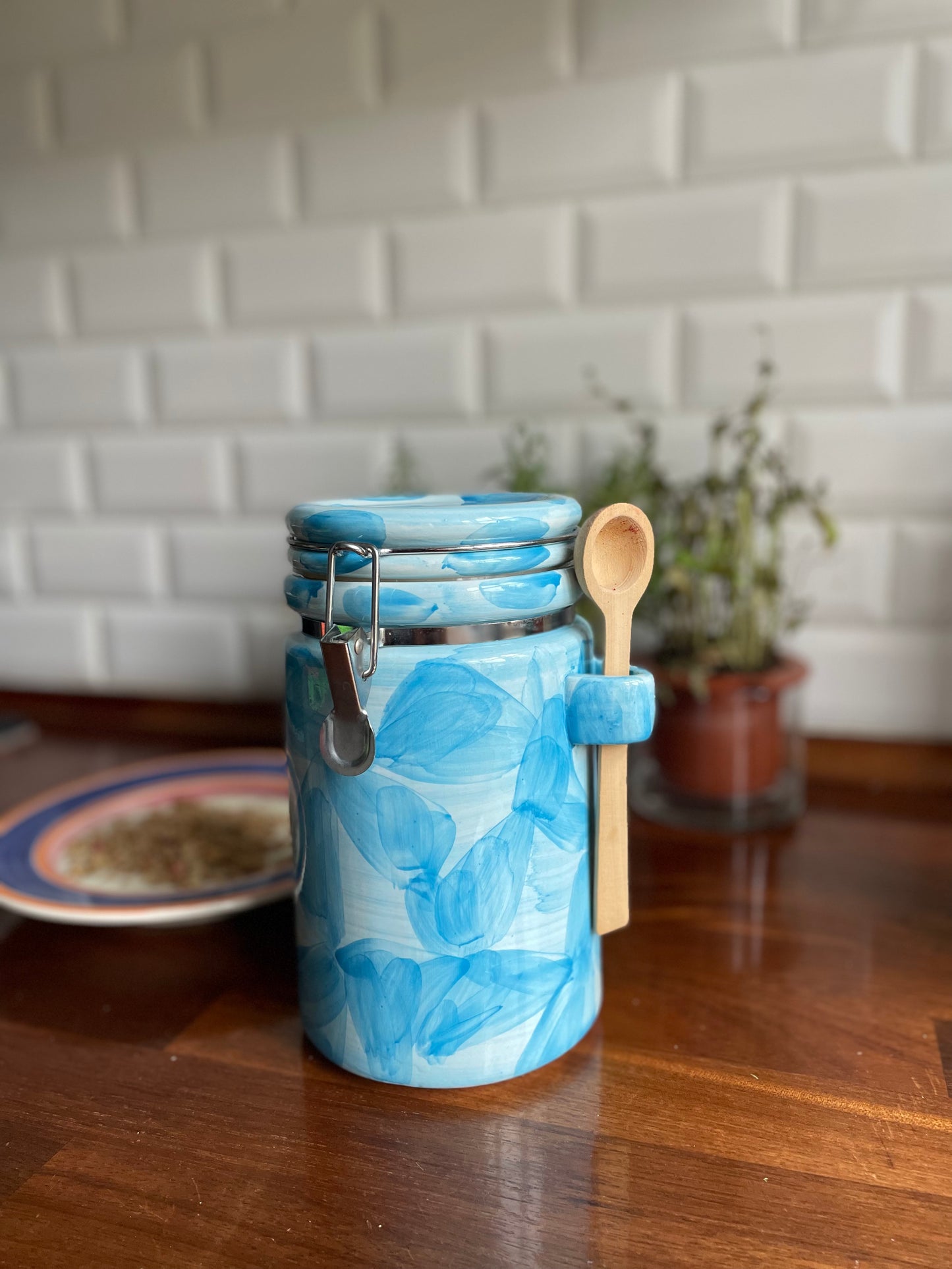 Blue lidded jar with spoon