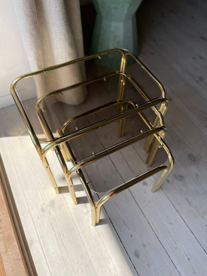 Brass insert tables with smoked glass