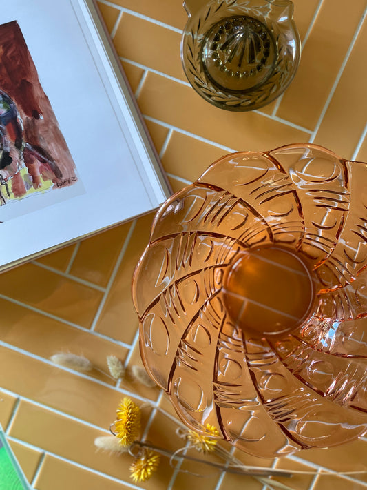 Coral colored glass bowl