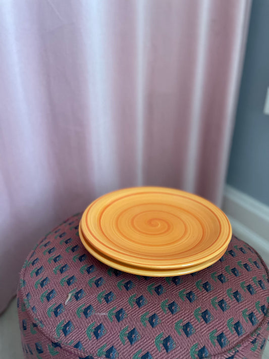 Orange dinner plates with swirl