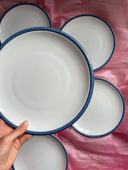 Dinner plates with blue twisted edge