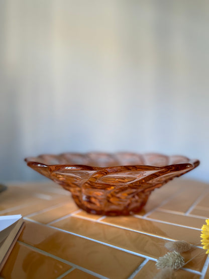 Coral colored glass bowl