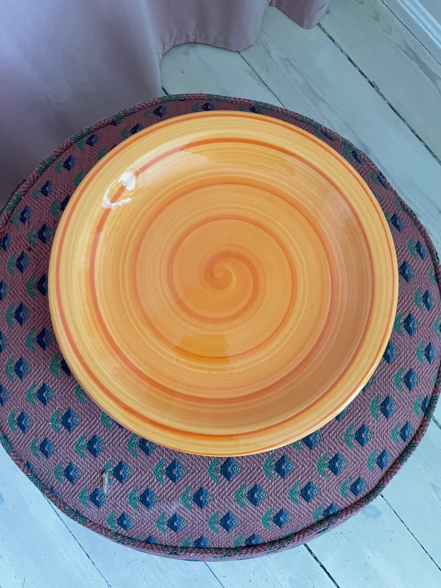 Orange dinner plates with swirl